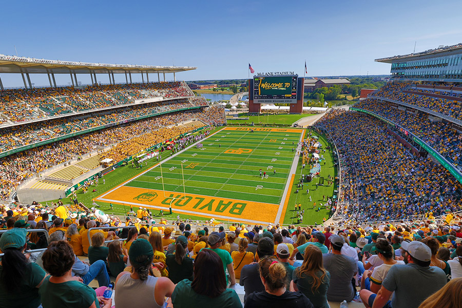 fans watching a football game at Baylor's McLane Stadium 