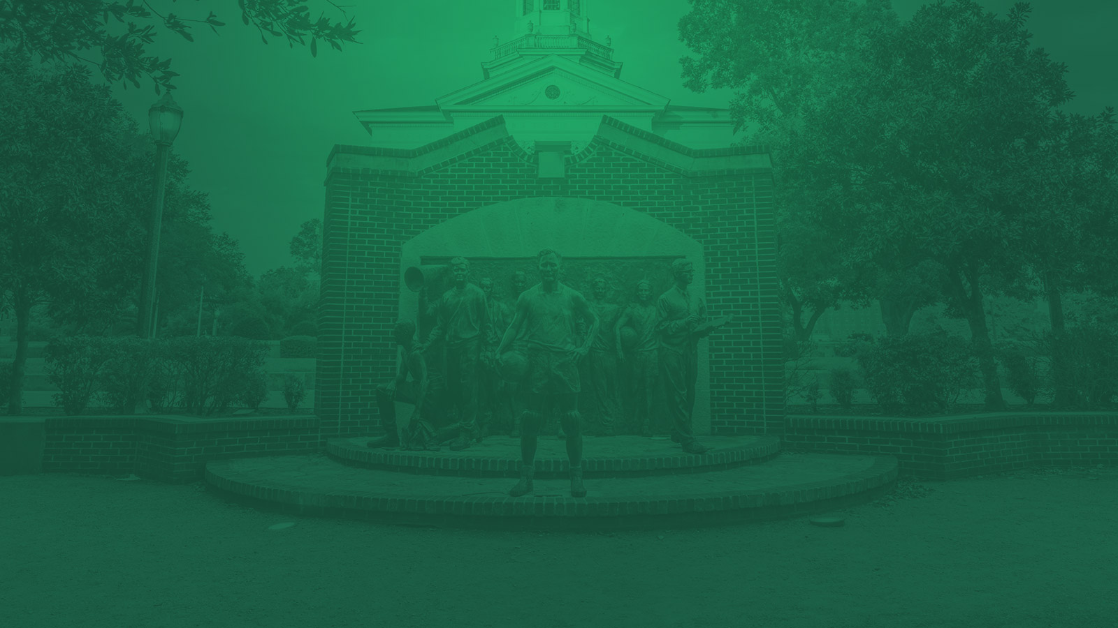 The Immortal Ten statue in front of Pat Neff Hall on the campus of Baylor University